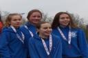 (l-r) Jasmine Young, Izzy Craven, Katie Clutterbuck and Amy Young secured a bronze medal for WSEH Athletics Club in the Under 17s women's race at the South of England Cross Country Championships in North London on Saturday.