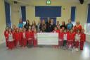 Rainbows give £700 cash boost to Thames Hospice