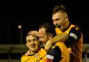 (l-r) Slough Town stars Warren Harris, Sam Togwell and George Wells celebrate a goal during the FA Trophy tie against Concord Rangers at Arbour Park on Tuesday night.