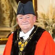 Cllr Neil Knowles in the Mayoral robes and chains