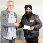 Slough Outreach 'thrilled' to be awarded cheque for work with local community