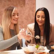Friends enjoy sweet treats at Heavenly Desserts which opened in Slough last September. Now operators want to sell these desserts until 1am. Credit: Heavenly Desserts