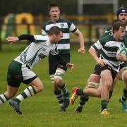 Slough (green and white) suffered a 39-5 defeat away at Reading in  Southern Counties North on Saturday. PHOTOS: Paul Johns. 181005.