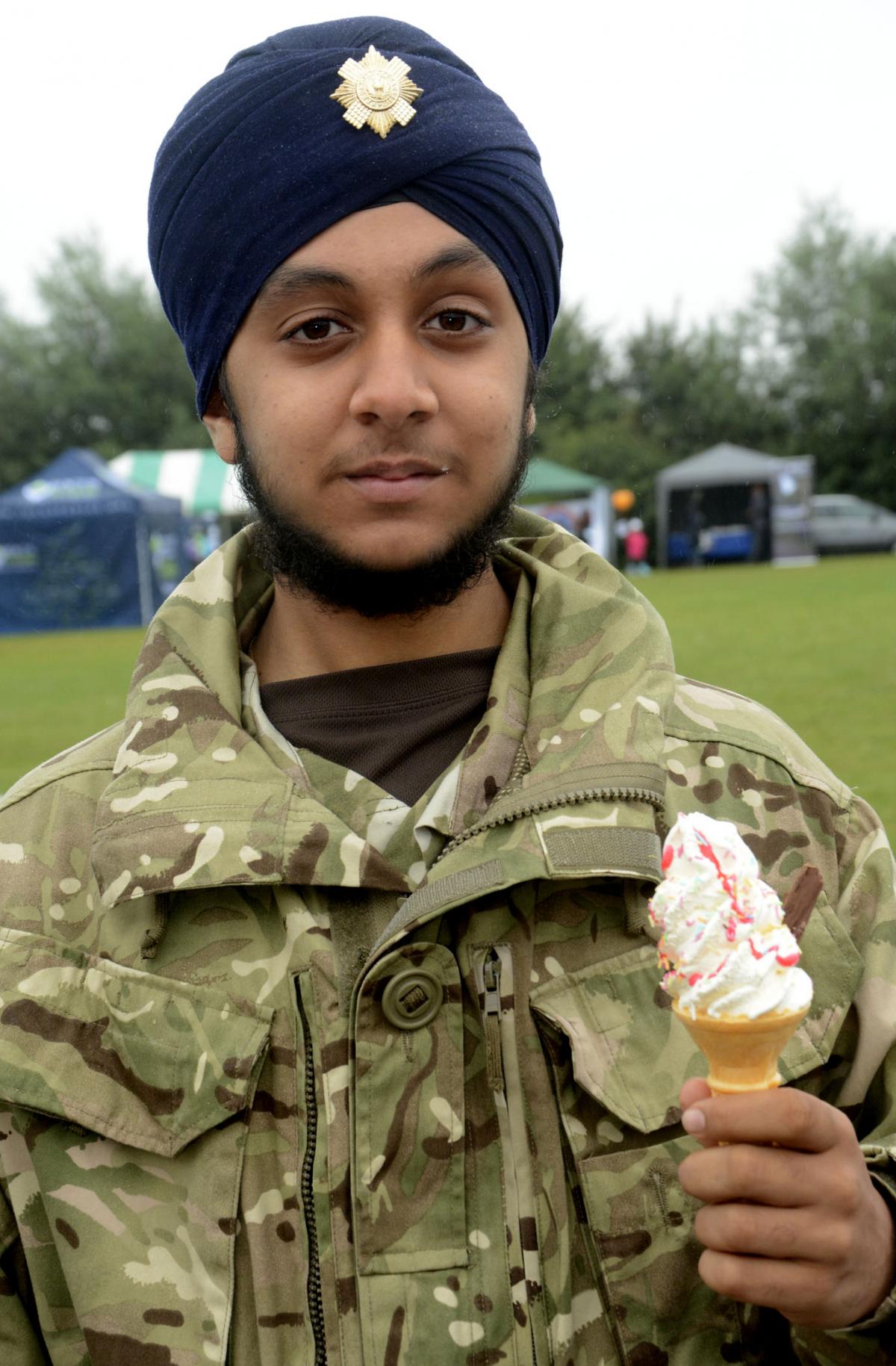 Gagan Bhachu, 14, from 3rd platoon Slough ACF enjoys an ice cream