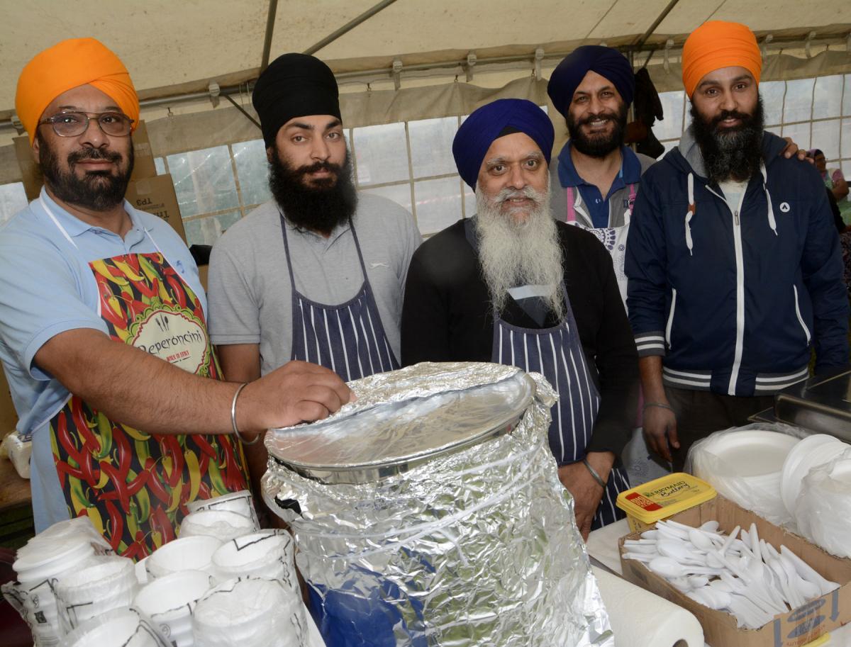 Baljiner Singh, Sunny Singh, Inderjit Singh, Inderpar Singh and Charanjit Singh serve up some food