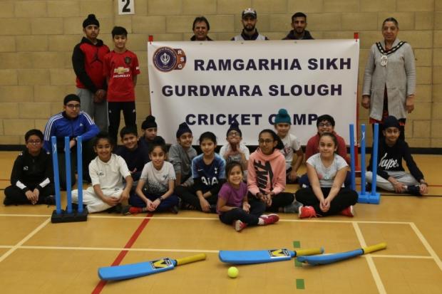 The Mayor of Slough, Councillor Avtar Kaur Cheema (back row and far right) opened the new youth indoor cricket training at Langley Grammar School.