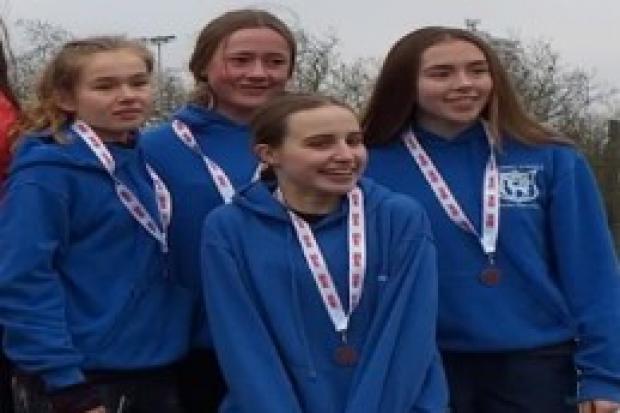 (l-r) Jasmine Young, Izzy Craven, Katie Clutterbuck and Amy Young secured a bronze medal for WSEH Athletics Club in the Under 17s women's race at the South of England Cross Country Championships in North London on Saturday.