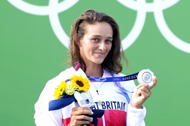 Great Britain's Mallory Franklin celebrates with her silver medal after the Women's C1 Canoe Slalom Final at the Kasai Canoe Slalom Centre on the sixth day of the Tokyo 2020 Olympic Games in Japan. Picture date: Thursday July 29, 2021.