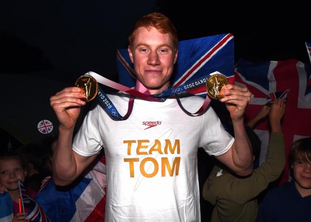 Slough Observer: Photo of Tom with his two gold medals by Eamonn McCormack, Getty Images for Speedo