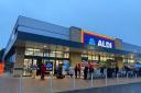 Dozens turn out for grand opening of new Aldi store