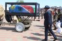 Mourners follow the flag-draped coffin of Hage Geingob during his funeral service in Windhoek, Namibia (Esther Mbathera/AP)