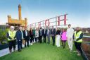 Horlicks Quarter development marks milestone by illuminating sign