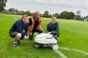 Robot paints lines in demo at Windsor playing pitch
