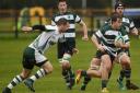 Slough (green and white) suffered a 39-5 defeat away at Reading in  Southern Counties North on Saturday. PHOTOS: Paul Johns. 181005.