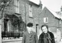 Ron, his sister Brenda and their cousin in the snow in Hencroft Street, Slough. The building with the chimneys in the background was the local school