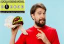 File photo of a man judging a burger