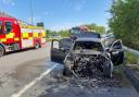 Major road closed due to car fire