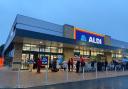 Dozens turn out for grand opening of new Aldi store