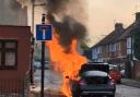 'Explosions and black fumes' seen as car bursts into flames