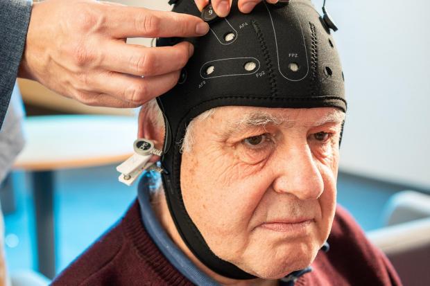 A man undergoing an EEG test