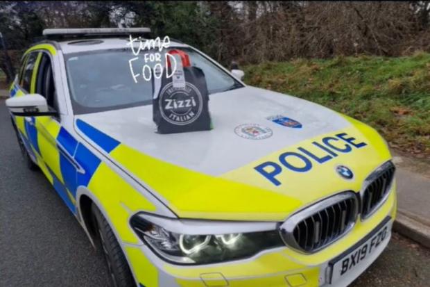 A Zizzi's takeaway delivered by Maidenhead police after they arrested the delivery driver, who was employed by a different company