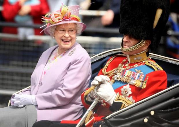 Slough Observer: The Queen and Philip return to Buckingham Palace following Trooping the Colour in 2010 (Dominic Lipinski/PA)
