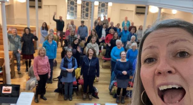 Slough Observer: Maidenhead Tuneless Choir posing for a selfie with choir leader Tabitha Beaven. Picture: Maidenhead Tuneless Choir
