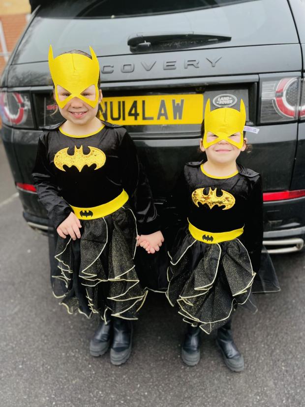Slough Observer: Nuala, 7 and Orlagh,4, as Batgirl from English Martyrs Catholic Primary School, Reading