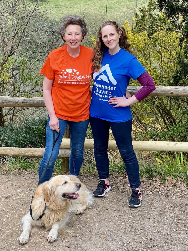 Slough Observer: Emma and her mum Sarah posing for a photo on their 79-mile walk.