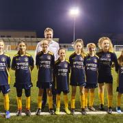 Phil Brown, the Managing & Sales Director of Fortress Technology and Managing Director of Sparc Systems, with the Slough Town Juniors U13s girls.