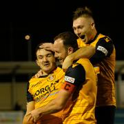 (l-r) Slough Town stars Warren Harris, Sam Togwell and George Wells celebrate a goal during the FA Trophy tie against Concord Rangers at Arbour Park on Tuesday night.