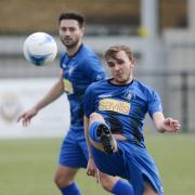 Chalvey Sports (blue and black) recovered from falling behind to beat Singh Sabha 3-1 in the semi final of the Slough Town Challenge Cup at Arbour Park on Saturday. PHOTOS: Paul Johns.