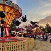 Families spinning around on the 'chair o'plane' ride. Picture: Carters Steam Fair