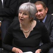 Theresa May shares cheesy tale about Queen in Commons tribute