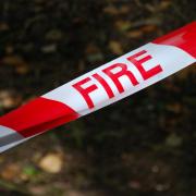 Front door set alight in arson attack in early morning