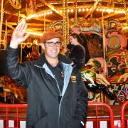 Joby Carter, owner of Carter's Steam Fair, waves goodbye to Reading for one last time on October 30