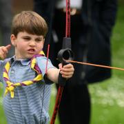 Prince Louis practicing archery
