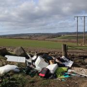 A stock image of fly-tipped refuse