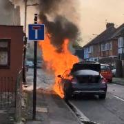 'Explosions and black fumes' seen as car bursts into flames