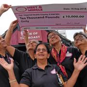 The Meet and Mingle ladies celebrate raising £10,000