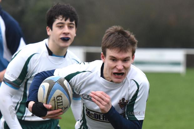 Slough (white and green) suffered a 28-20 defeat to Berkshire rivals Reading at Tamblyn Fields in Southern Counties North on Saturday.